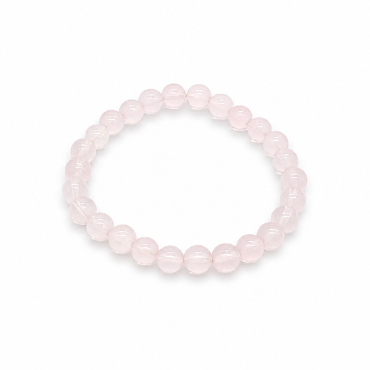 Star Rose Quartz bracelet Style B with soft lavender-pink Madagascar beads and visible asterism