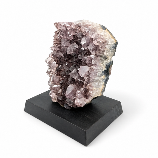 Brazilian Amethyst spire showing rainbow flash at termination tips