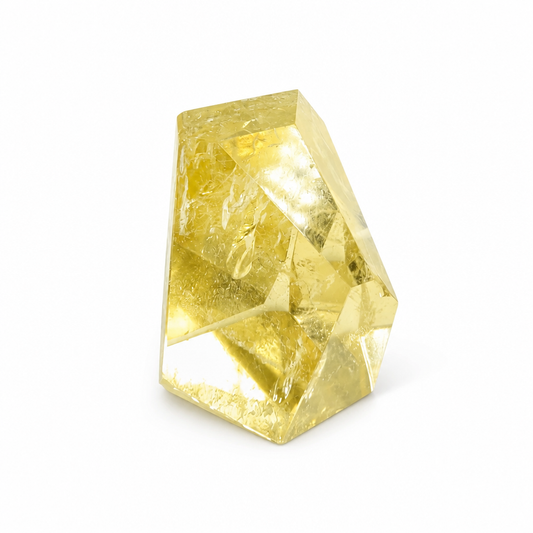 Natural Brazilian Citrine specimen catching sunlight to show warm amber colour
