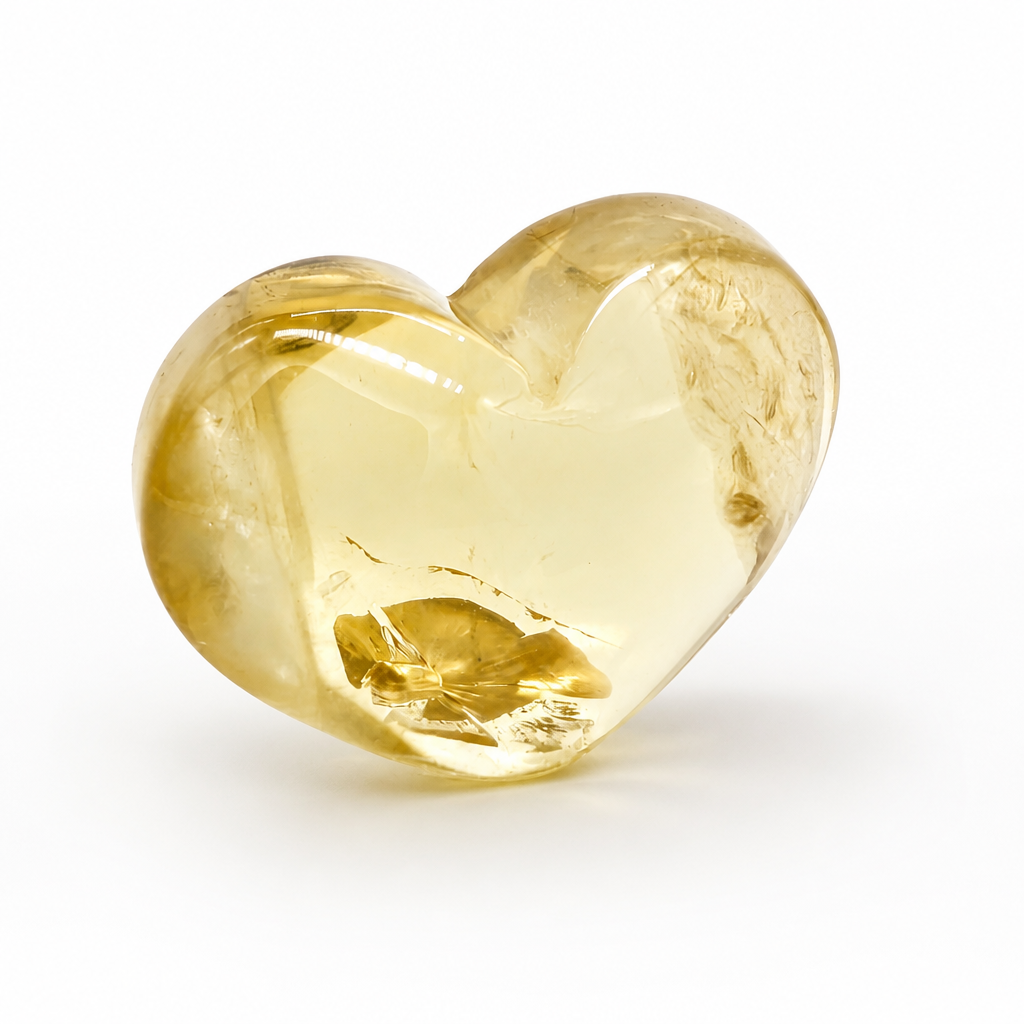 Top view of the solar rainbow citrine heart showing natural internal rainbow formations
