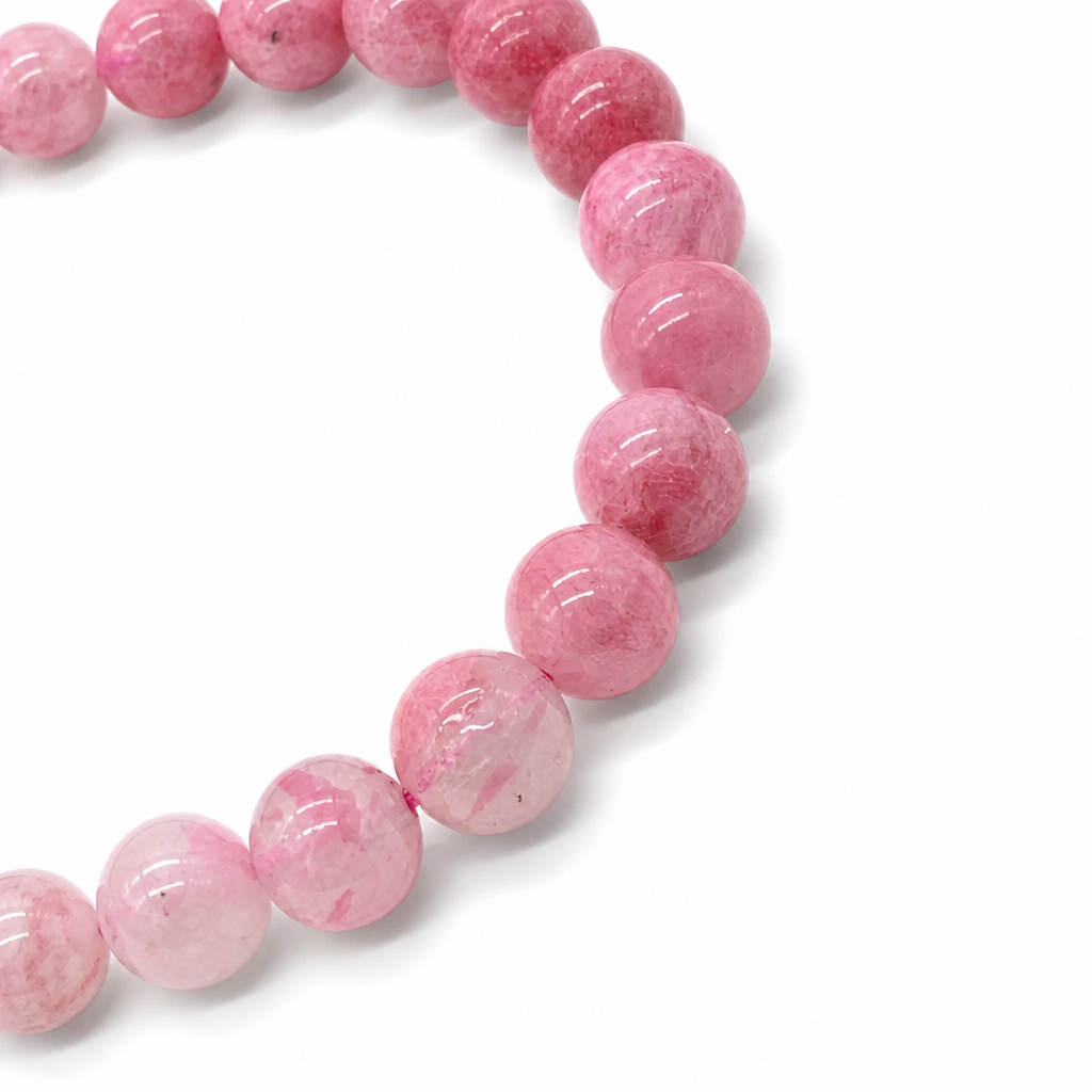 Handmade Rhodonite Gradient ombré pure crystal bracelet by AuraLune Crystal on white background