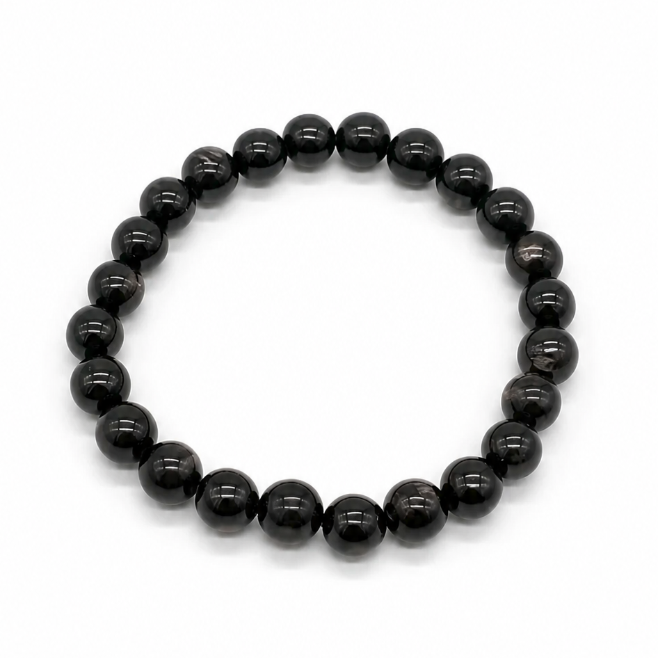 Hypersthene grounding crystal bracelet styled on wrist, minimalist Japanese-inspired styling