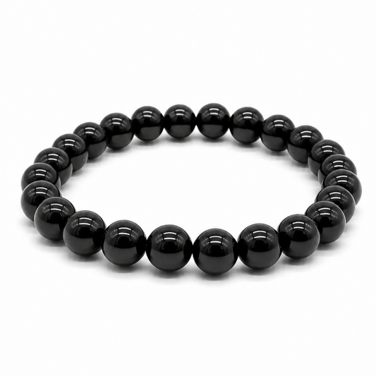Handmade hypersthene crystal bracelet, deep black-grey beads with silvery sheen, on white background