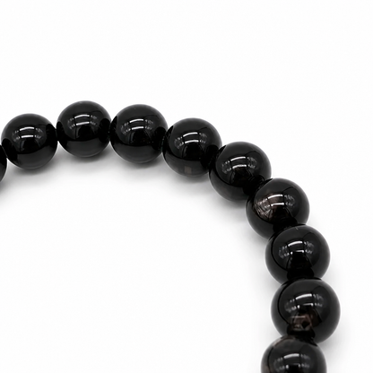 Close-up of hypersthene beads showing natural silvery adularescence, Aura Lune crystal jewellery