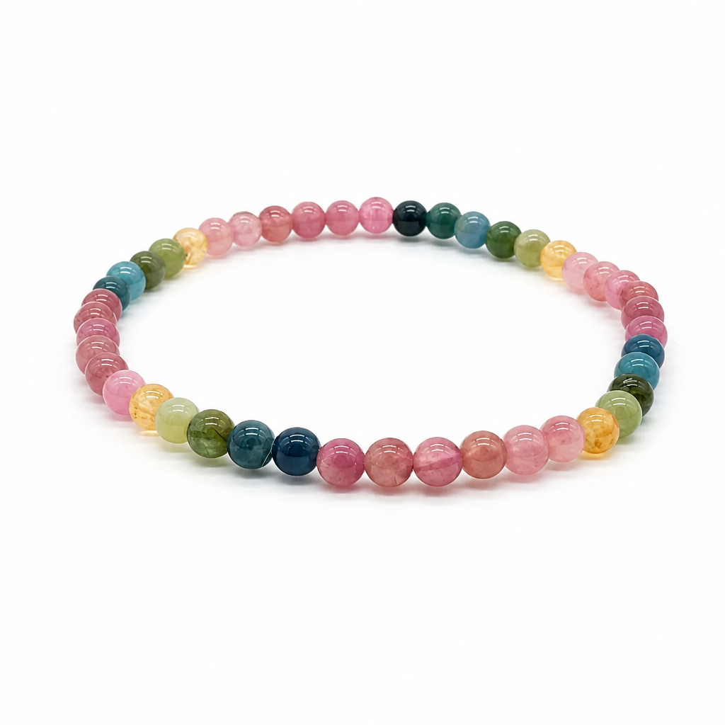 Rainbow tourmaline bracelet with multi-colour round beads on a white background