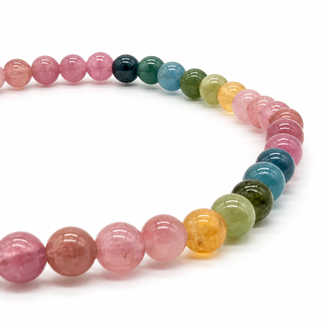 Rainbow tourmaline crystal bracelet showing pink, green and blue beads