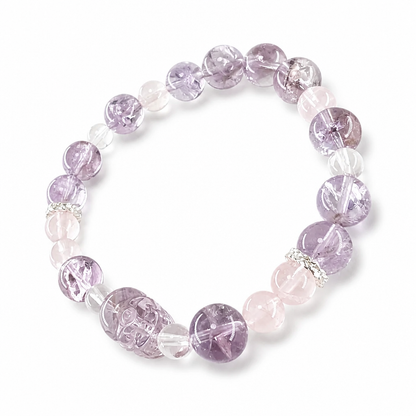 Blush Rose Quartz beads with silver-toned accents, detail view