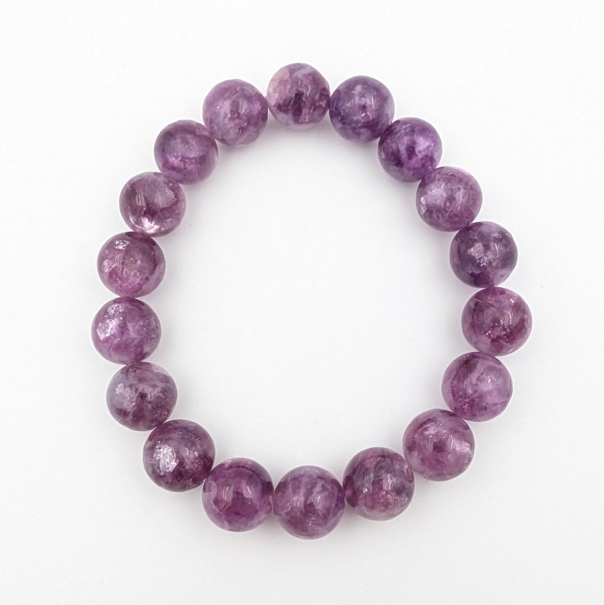 Lepidolite bracelet photographed from above in daylight