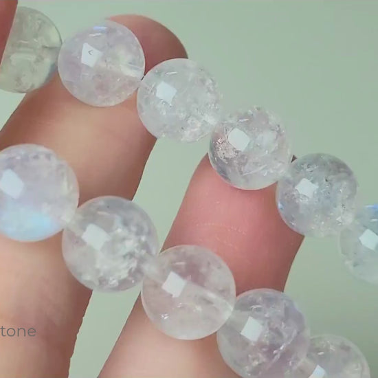 Indian moonstone bracelet with milky-opaque white 9mm round beads showing subtle blue and white sheen