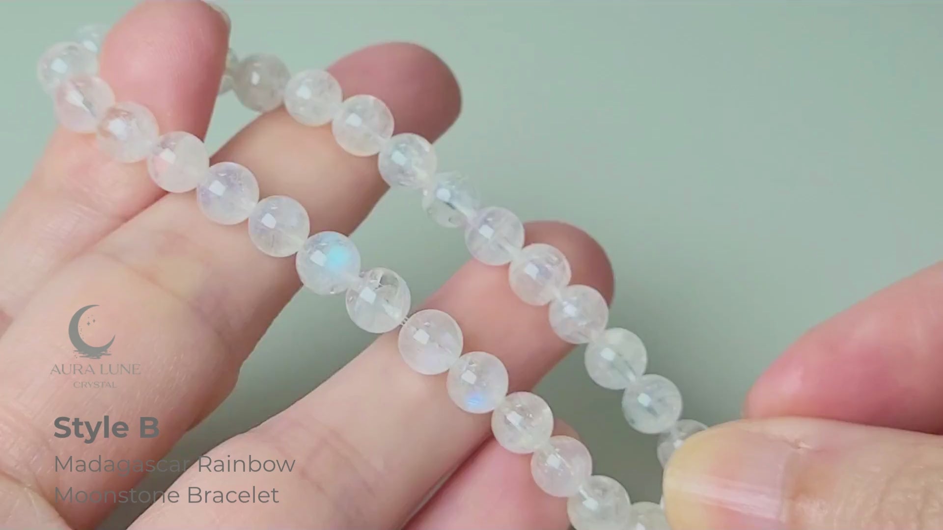 Madagascar Rainbow Moonstone Bracelet video — 6mm polished round beads showing live blue flash adularescence movement in natural light