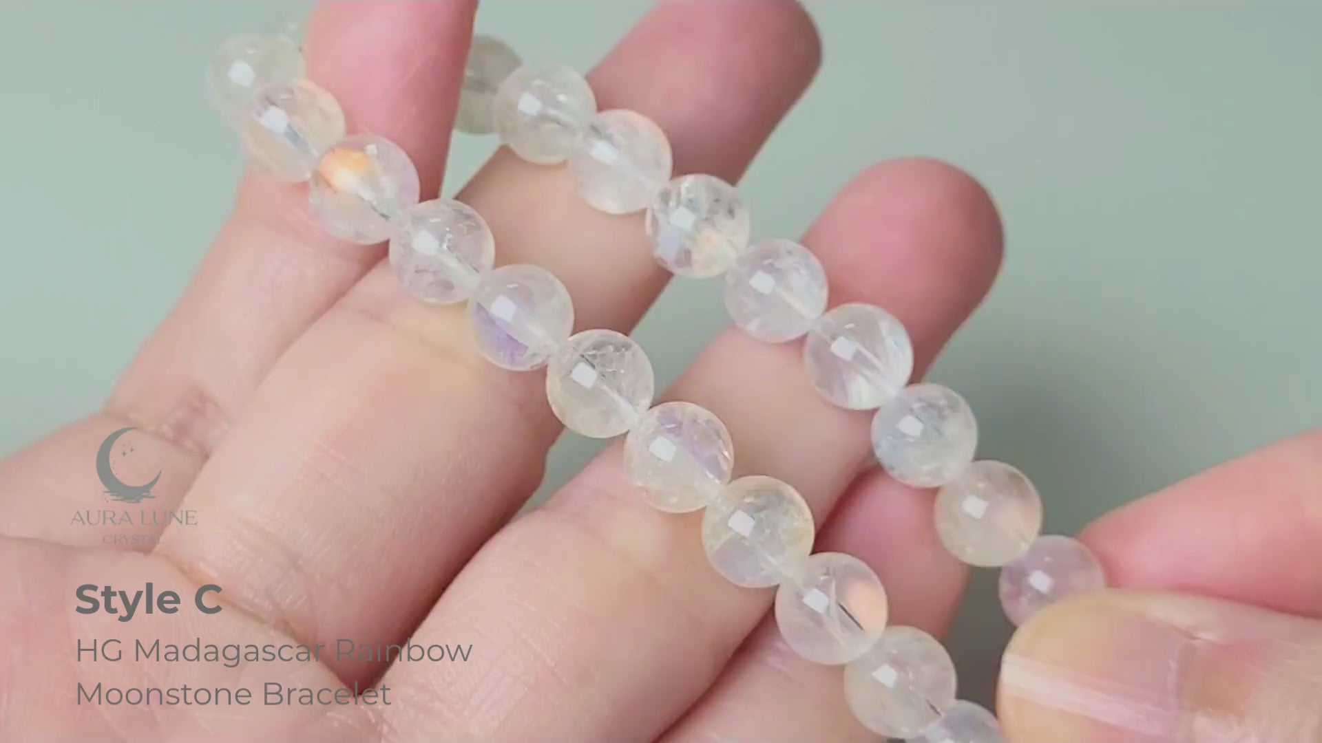 High grade Madagascar rainbow moonstone bracelet with premium 7-8mm polished round beads showing strong blue labradorescence flash