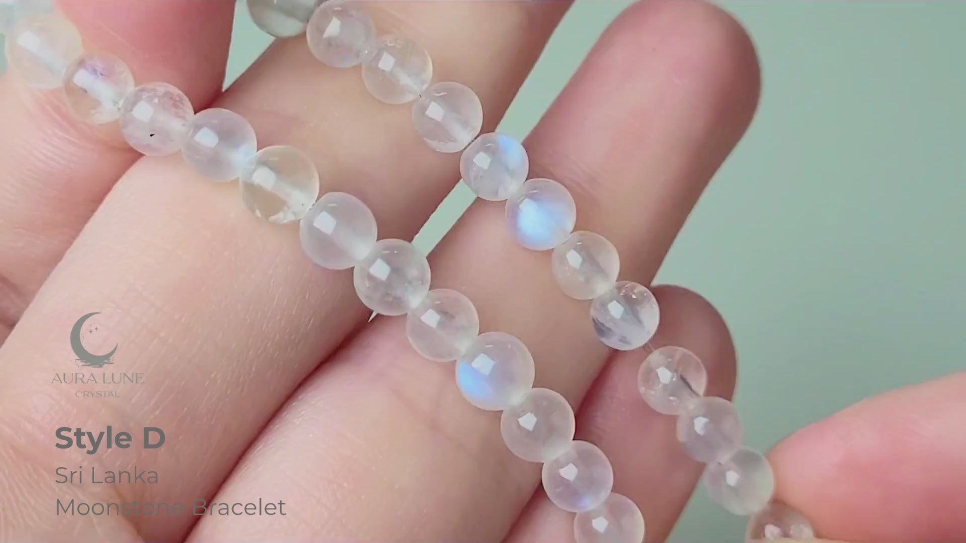 Sri Lanka Ceylon moonstone bracelet with translucent silvery-white round beads showing characteristic blue flash adularescence