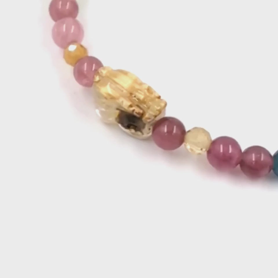 Golden Pixiu Rainbow Tourmaline designer bracelet with golden pixiu charm and multi-color tourmaline beads showing full chakra spectrum