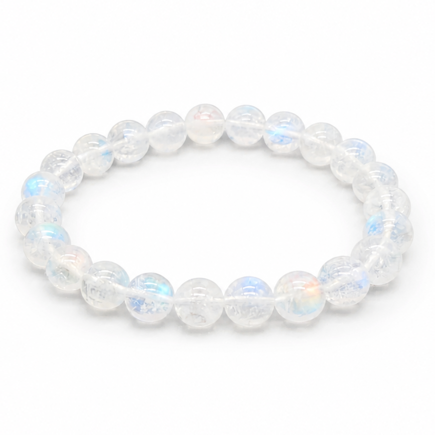 Close-up of vivid blue-white flash drifting across high-grade Madagascar Moonstone beads