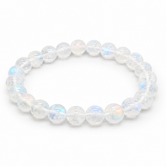 Close-up of vivid blue-white flash drifting across high-grade Madagascar Moonstone beads