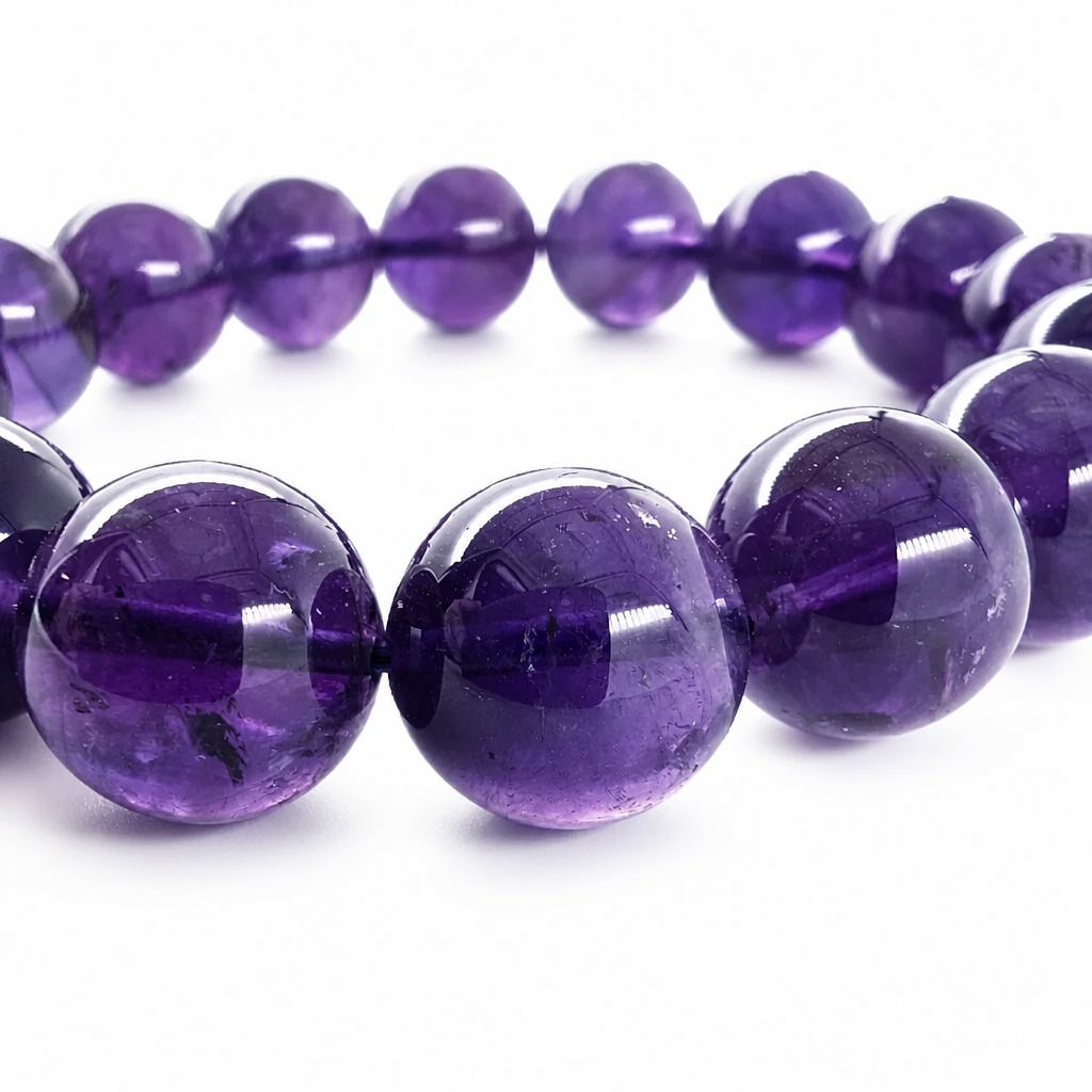 Uruguayan amethyst crystal bracelet curved on a white background