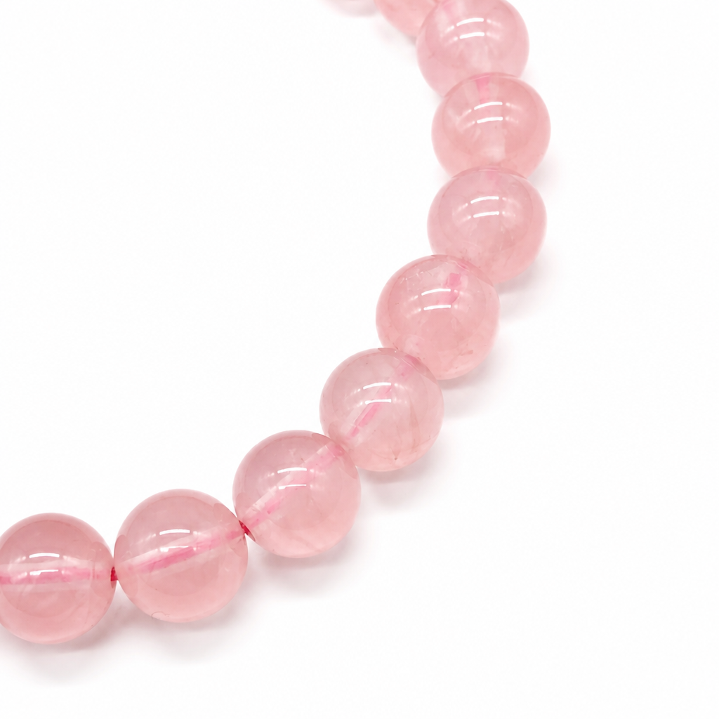 Mozambique rose quartz bracelet curved on white