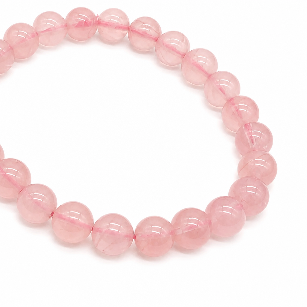 Translucent rose quartz bead letting light through