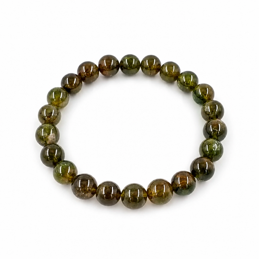Close-up of glassy clarity in deep forest green verdelite tourmaline beads
