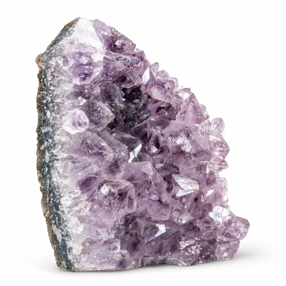 Violet phantom shadow visible inside the peak formation of the amethyst spire