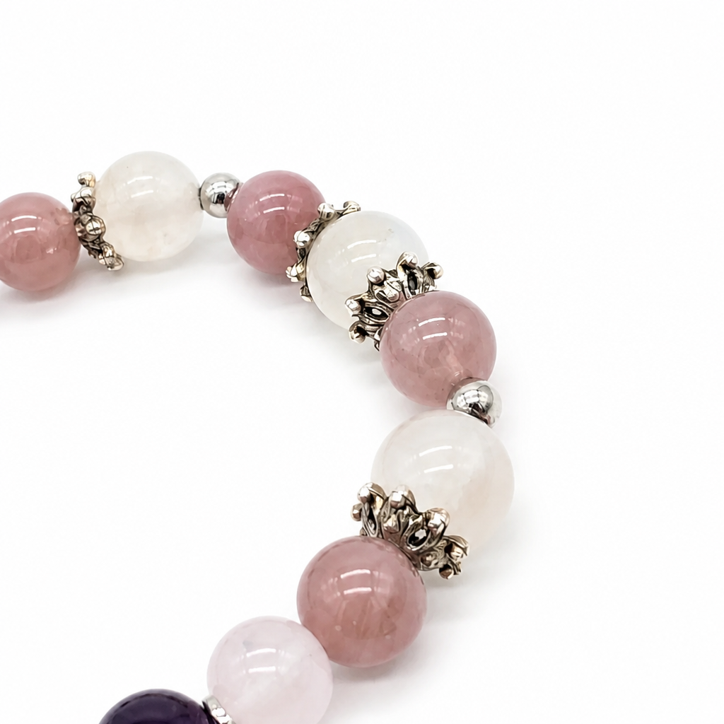 Mixed 6 to 11mm amethyst, moonstone and rose quartz beads on elastic cord