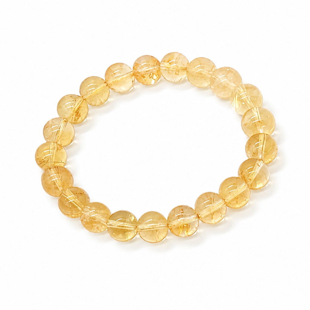 Bold 10mm natural citrine beads on a white background