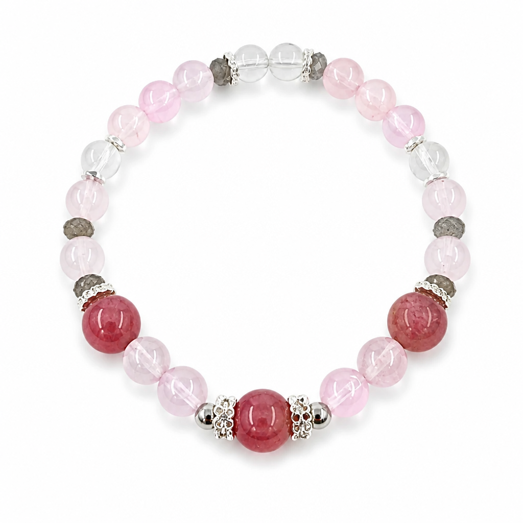 Close-up of lavender purple rose quartz, blush rose quartz, labradorite and clear quartz beads
