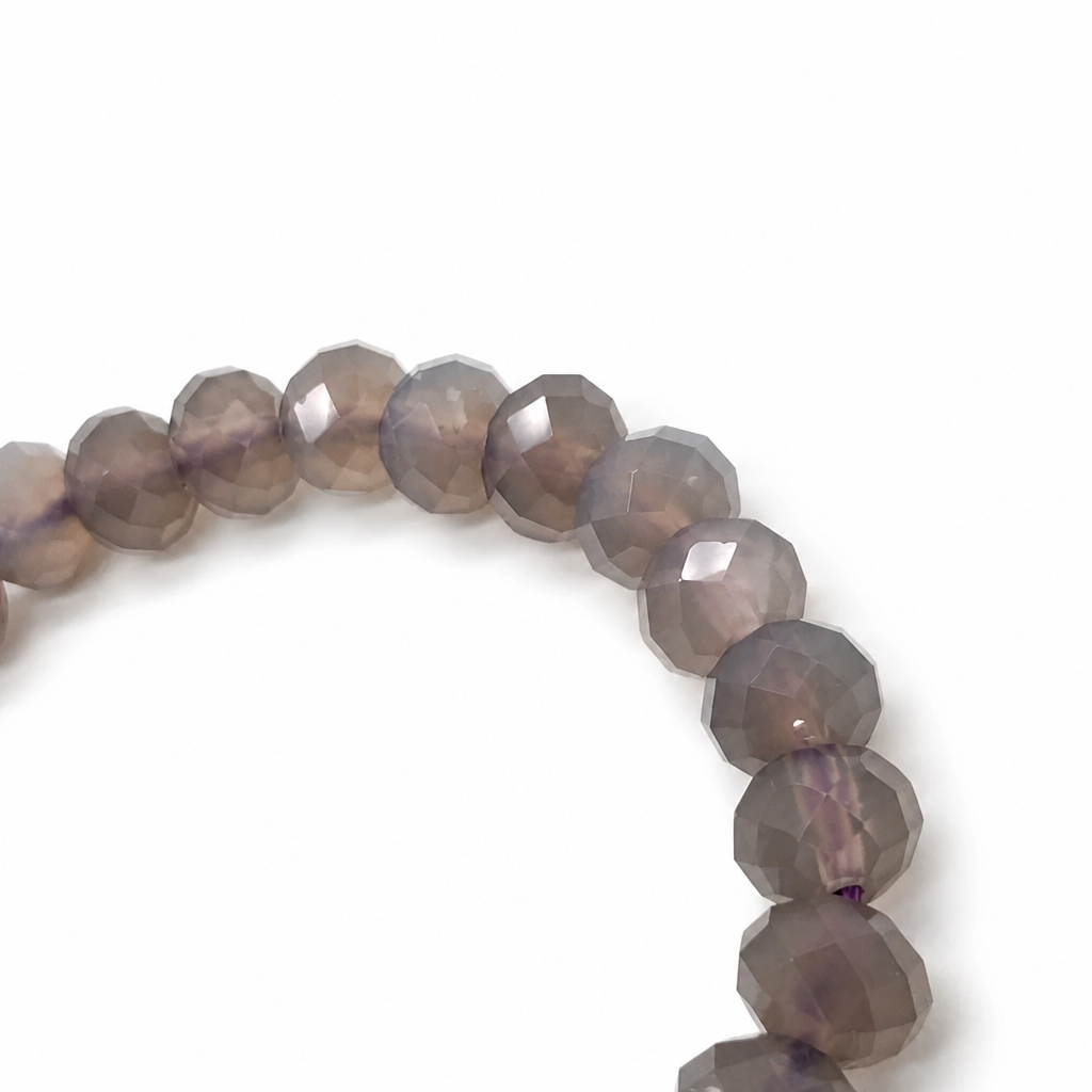 Rich amethyst-purple chalcedony beads detail