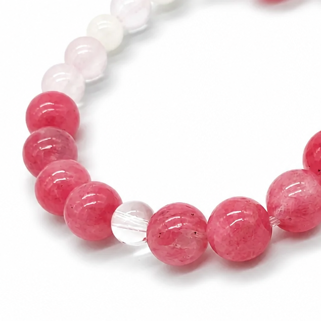 Side view of the Lunar Rescue bracelet showing 7.5mm bead sizing on a pale surface