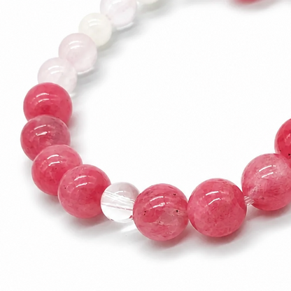 Side view of the Lunar Rescue bracelet showing 7.5mm bead sizing on a pale surface