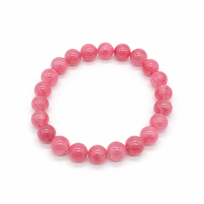 Deep saturated rose-pink rhodonite bead with black veins