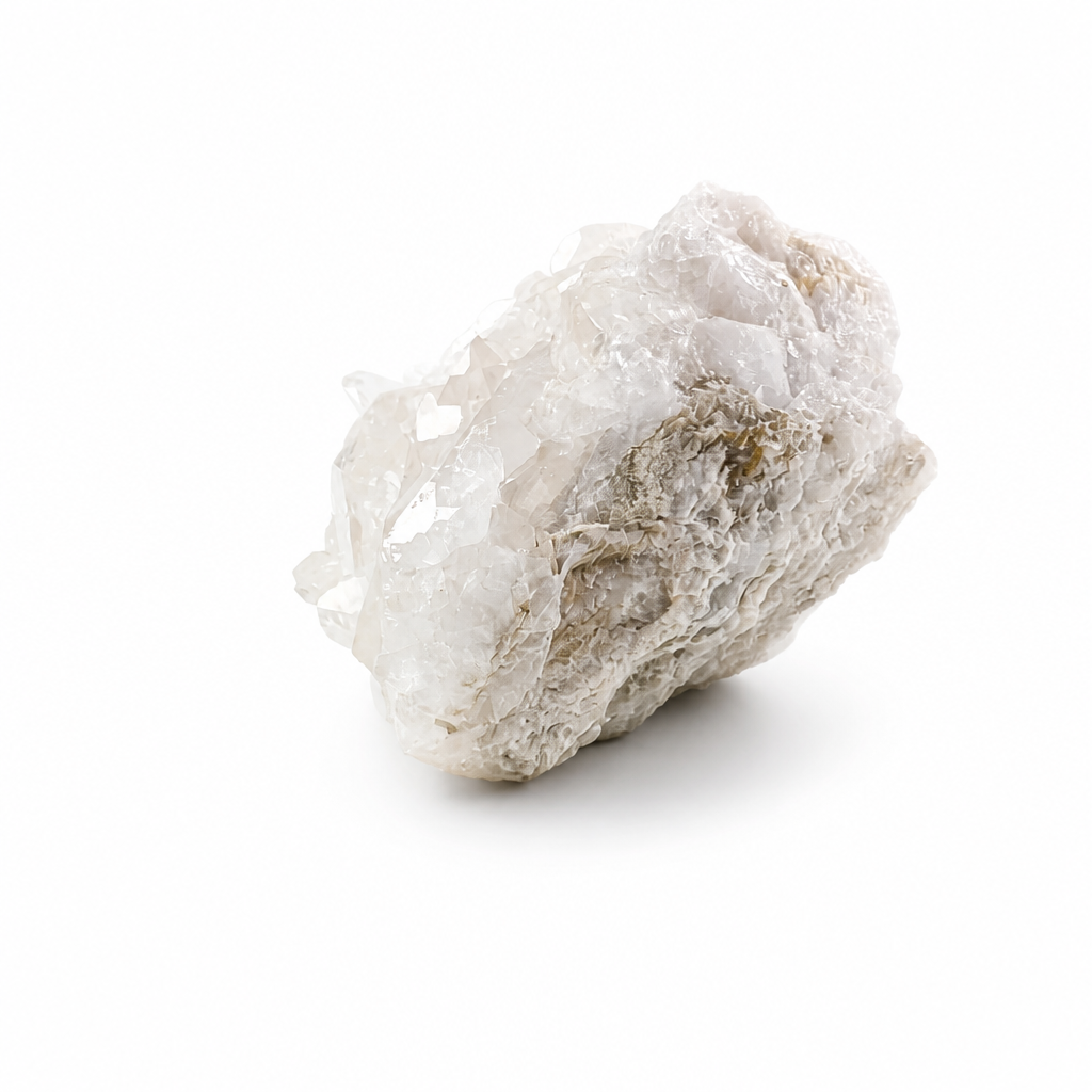 Clear Quartz cluster catching angled light to reveal prismatic point clarity