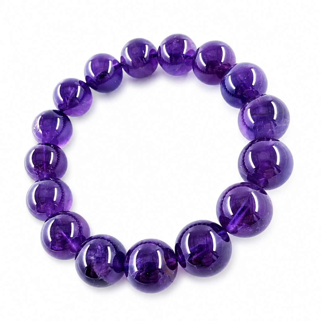 Close-up of AAA Uruguayan amethyst beads with red flashes