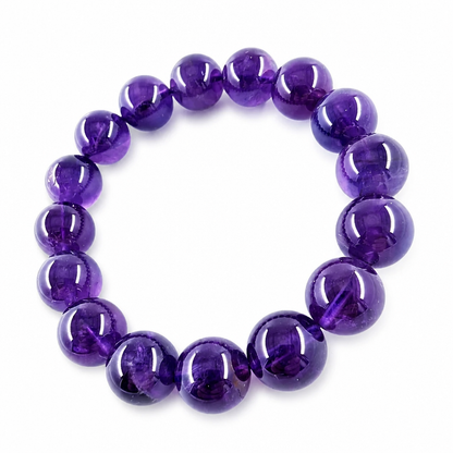 Close-up of AAA Uruguayan amethyst beads with red flashes