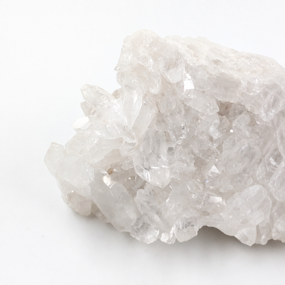 Full front view of the natural Clear Quartz cluster on a white background