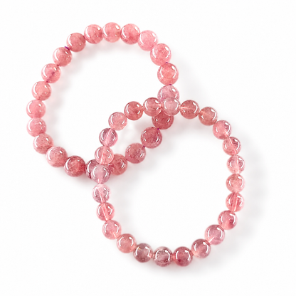 Side view of purple star rose quartz beads on a high-elastic cord