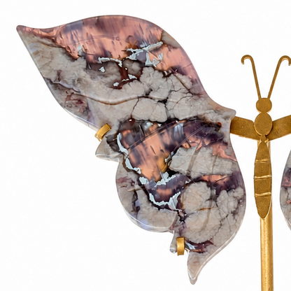 Side view of the indigo agate butterfly on its gold stand