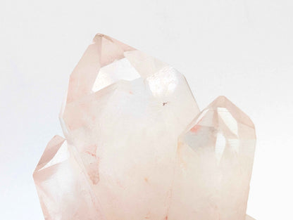 Angled view of the Pink Samadhi Quartz cluster showing crystal point formation