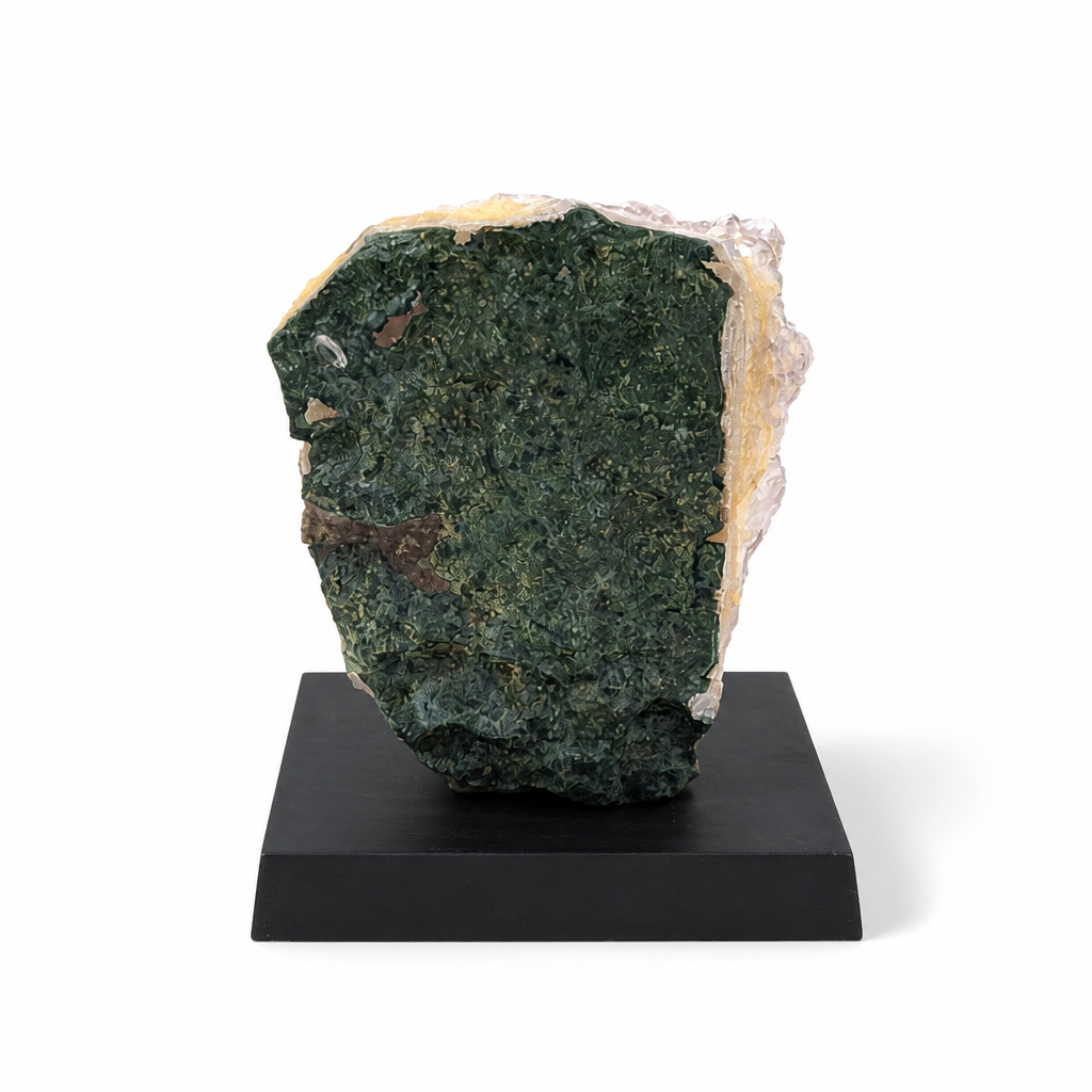 Brazilian Amethyst spire with Goethite inclusions displayed as a home decor piece