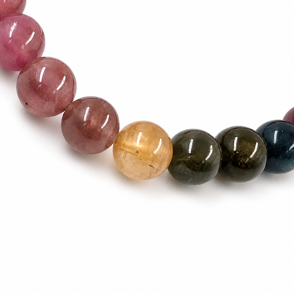 Side view of the 7.5mm Rainbow Tourmaline bracelet showing bead saturation