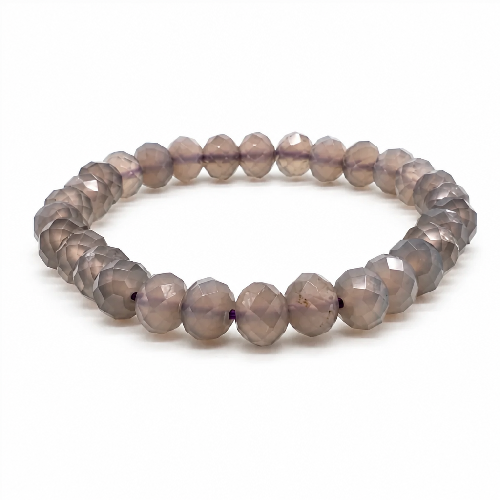 Deep uniform purple chalcedony bead catching the light