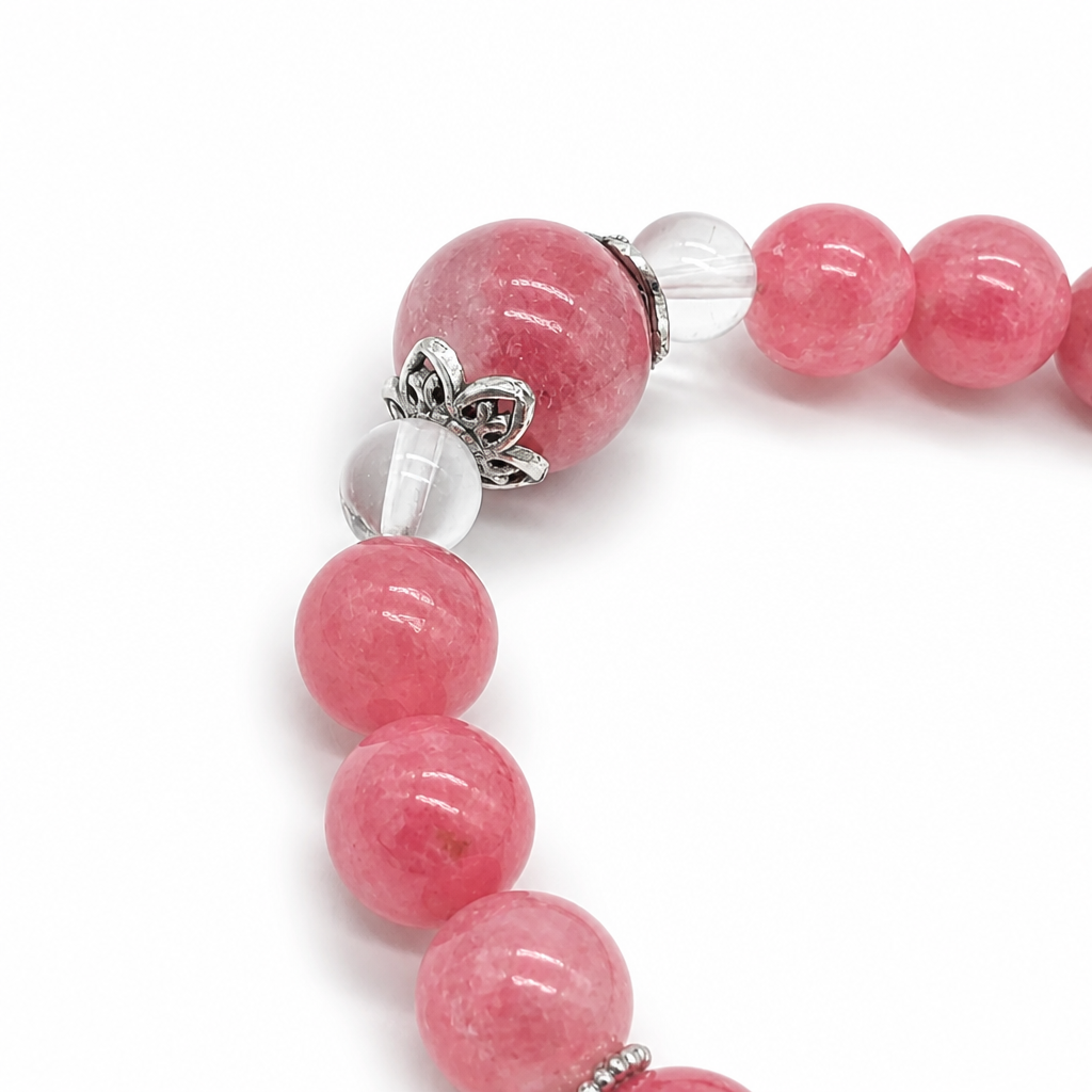 Soft powdery blush Madagascar rose quartz beads alongside bold veined rhodonite