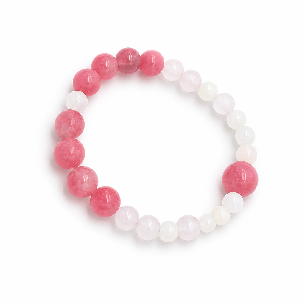 Lunar Rescue designer bracelet worn on the wrist showing warm pink and milky white tones