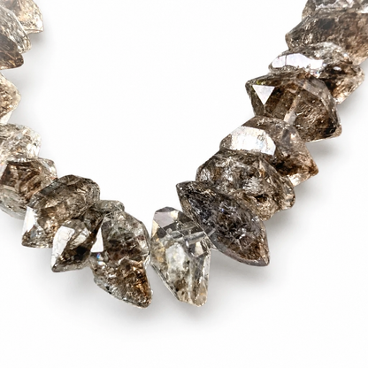 Clear quartz freeform crystals showing natural facets and inclusions
