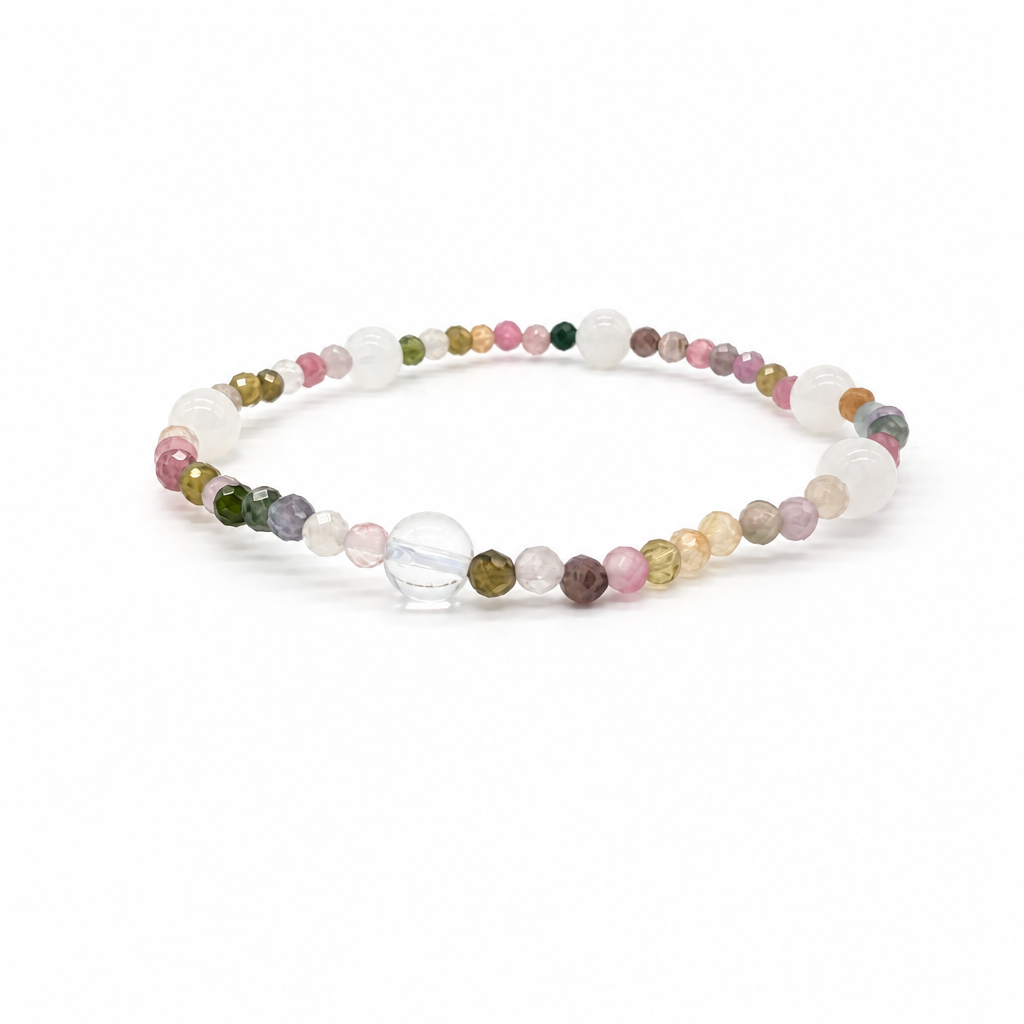 Pink, green and blue rainbow tourmaline beads on the wrist