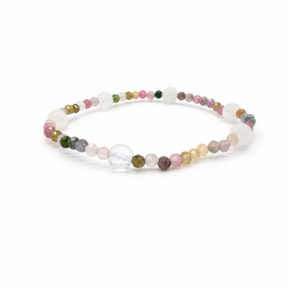 Pink, green and blue rainbow tourmaline beads on the wrist