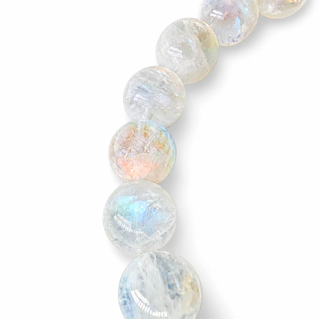 Rosewater Moon bracelet angled to reveal the shifting pink-blue moonstone sheen
