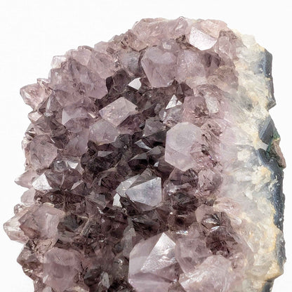 Angled view of the phantom amethyst spire catching light to reveal rainbow flash
