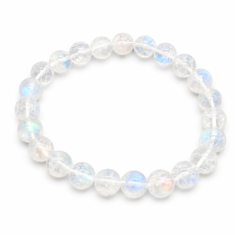 HG Madagascar Moonstone bracelet with vivid blue-white adularescence flash on white surface