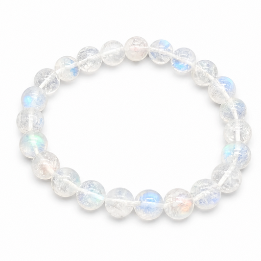 HG Madagascar Moonstone bracelet with vivid blue-white adularescence flash on white surface